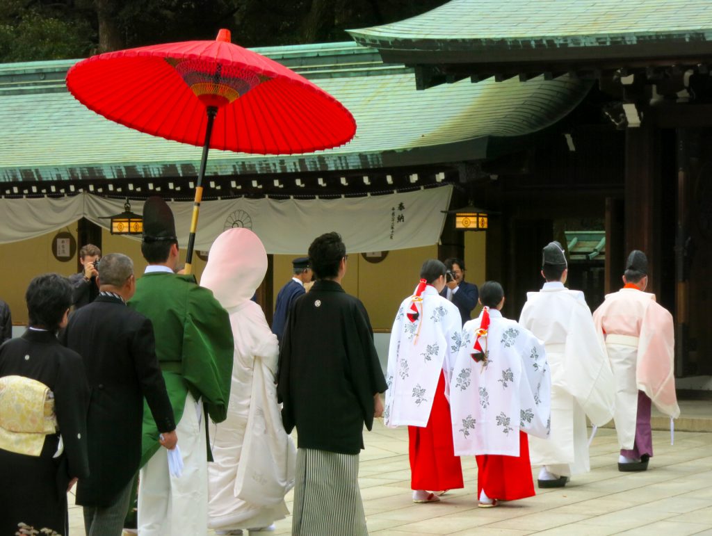 Wearing kimono for Japanese traditional wedding